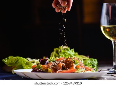Freezer food prepare in process vegetarian salad by chef hand in home kitchen. Dark black background with Text area for design menu restaurant - Shutterstock ID 1257459310