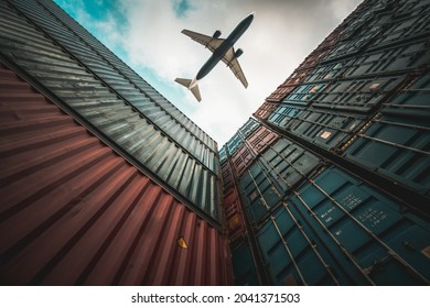 Freight airplane flying above overseas shipping container . Logistics supply chain management and international goods export concept . - Shutterstock ID 2041371503