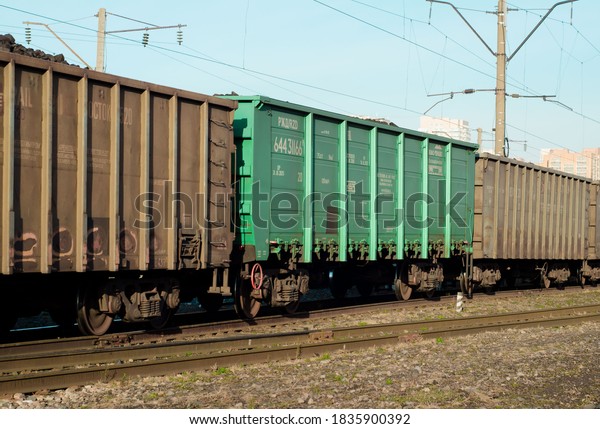 freight Cars in a moving\
freight train. Transportation by rail. Russia Krasnoyarsk, October\
17, 2020