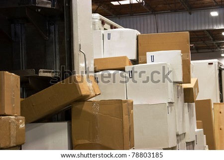 Freight off loaded from inside the trucks.
