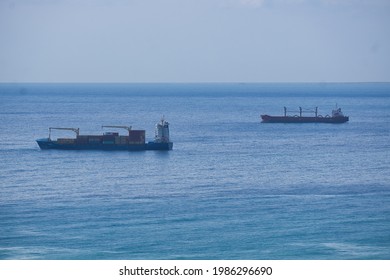 Freight Ship Setting Sail From The Port. View