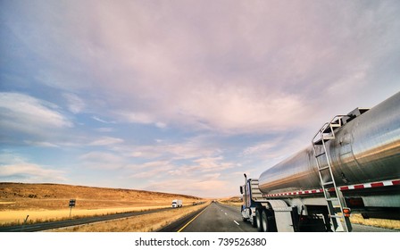 freight tanker truck on open highway in desert