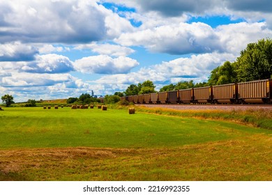 freight train in the American countryside - Shutterstock ID 2216992355