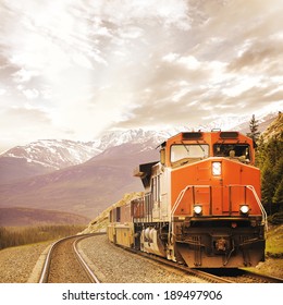 Freight Train In Canadian Rockies.