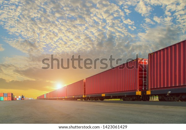 Freight Train with Cargo\
Containers, Transport, Shipping import Export on sunset sky\
background