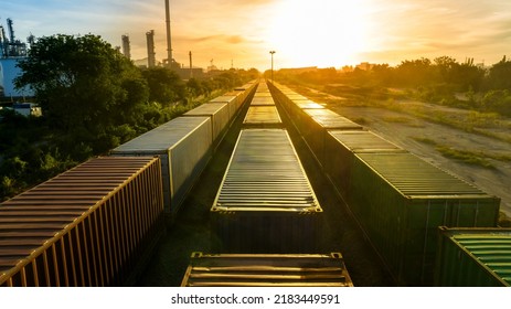 Freight Train With Containers Cargos At Sunset Sky Back Ground, Freight Service Forwarding And Logistics Transportation Industry Concept