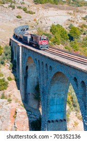  Freight Train Crosses The Old Varda Railroad Bridge.