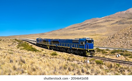 Freight Train At High Altitude In The Andes In Peru