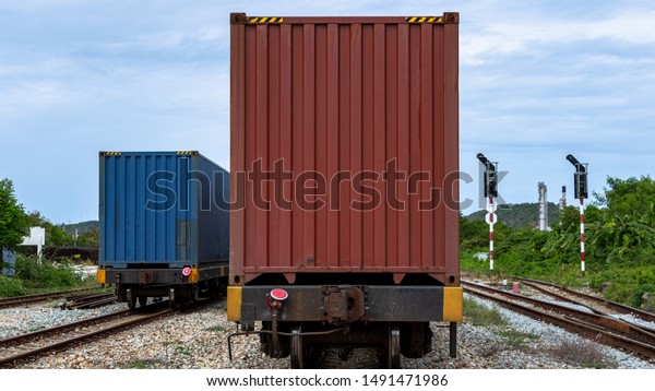 freight train loaded with shipping containers,\
Cargo train platform