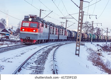 Freight Train Moves Along Baikal Lake. Trans Siberian Railway. Russia.