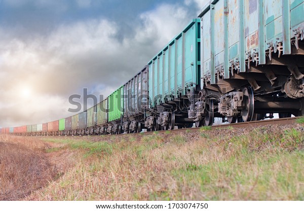 Freight train, transportation\
of railway cars by cargo containers shipping. Railway logistics\
concept