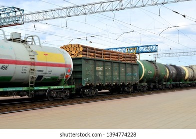 Freight Train, Transporting Of Wagons With Wood Andtank Car LNG By, Natural Gas, Crude Oil And Ethanol. - Image