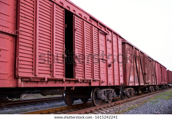 Freight train wagon on\
rails close up