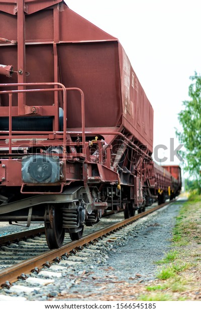 freight train with freight wagons at a shunt yard\
in Europe
