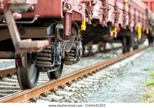 freight train with freight wagons at a shunt yard\
in Europe