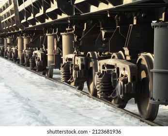 Freight Train Wheels Close Up, In Perspective, Winter Sunny Day