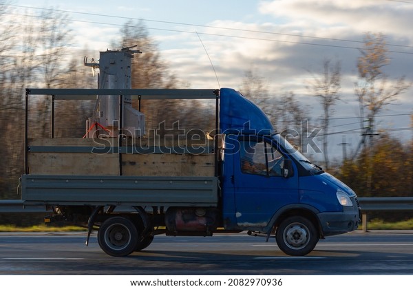 Freight transportation. The van delivers quickly around\
the city. 