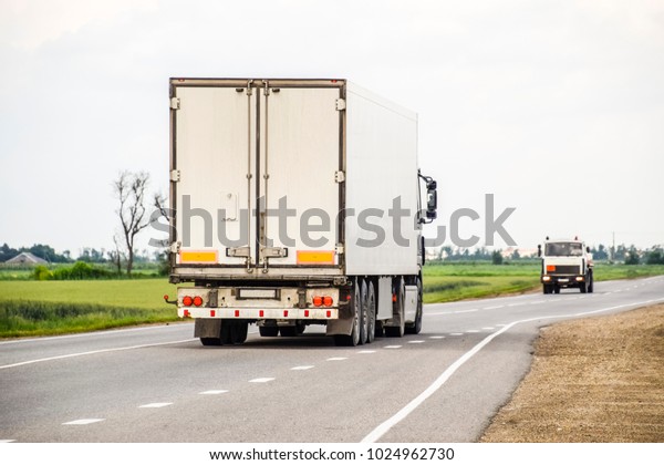Freight\
vehicles on the track. Freight car.\
Truck