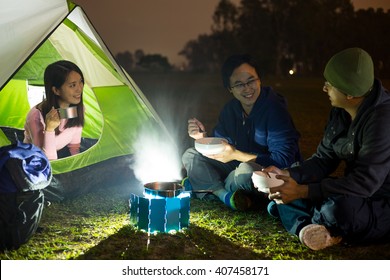 Freinds Go Camping At Night