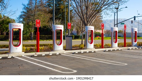 Fremont, CA, USA - January 20, 2021: Tesla Supercharger for electric cars. Tesla is  an American electric vehicle and clean energy company based in Palo Alto, California