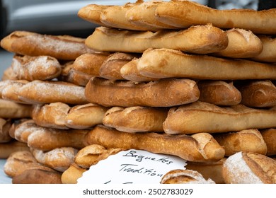 French artisan bakery in Bordeaux, fresh baked rye and wheat bread and baguettes, France, french food - Powered by Shutterstock