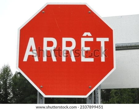 French Canadian stop road sign