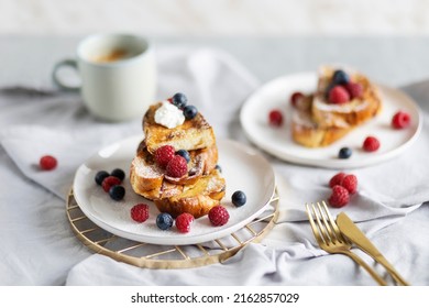French cinnamon toast with blueberries, raspberries, sugar and coffee. Morning breakfast. French breakfast.  - Powered by Shutterstock