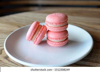 French Colorful Macarons Colorful Pastel Macarons On The Plate In Cafe Pink Macaron Raspberry Macaron Strawberry Macaron 