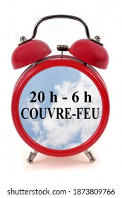 French Curfew Concept With A Bell Alarm Clock On White Background