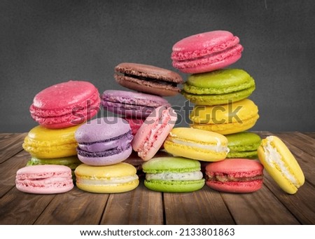 Similar – Image, Stock Photo Colored macaroons on rustic wooden background