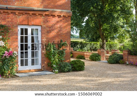 French doors outside a traditional Victorian house in England, UK