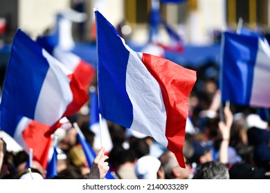 French Flag Isolated In A Crowd Of People Waving Many Other Flags. Supporters. Fan Zone.