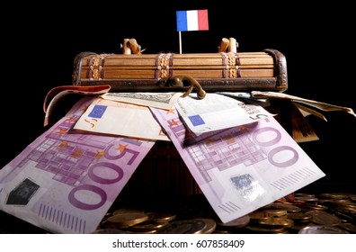 French Flag On Top Of Crate Full Of Money