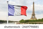 French flag in the summer of the Paris 2024 Olympic games, Eiffel tower in Paris, France, panoramic background