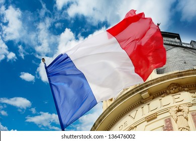 French Flag Waving Over One Hotel De Ville