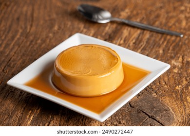 french flan on dark wood - Powered by Shutterstock