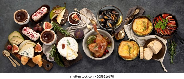 French food assortment on dark background. Traditional cuisine concept. Top view, flat lay, panorama - Shutterstock ID 2059316678