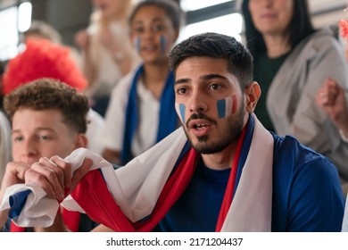 French football fans celebrating their team at stadium. - Powered by Shutterstock