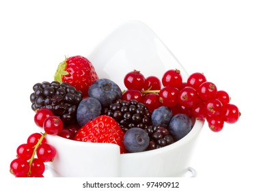 French Fries Bag Filled With Fresh Fruit Like Healthy Snack Over White Background