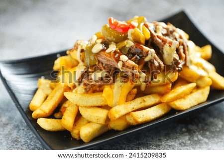 french fries with cheese on white background 