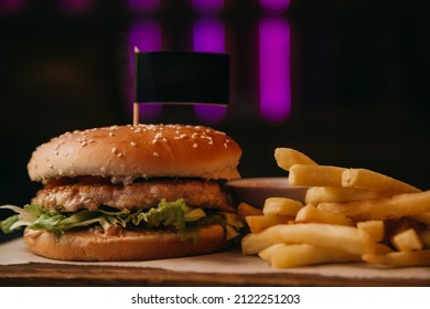 French Fries, Hamburger With Beef And Sauce, Concept Of Fast Food Place On The Flags For The Logo. Black Label Flag Mock Up For Your Logo