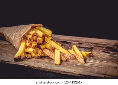 French fries Pommes Frites on Wood Dark
