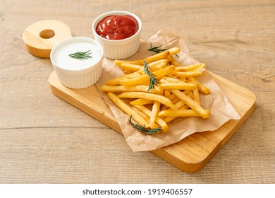 French Fries Or Potato Chips With Sour Cream And Ketchup