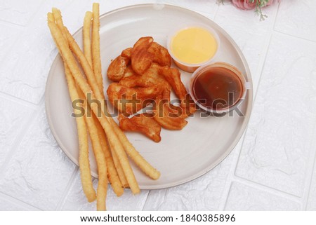 French fries with sauce on a plate