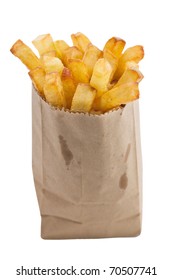 French fries in a small brown paper bag. Isolated on white background with clipping path.  Shallow depth of field.