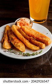 French Fries. Sweet Potato, Hand Cut Twice Fried, Jalapeño, And Fried Loaded Baked Potato With Bacon Bits, Sour Cream, Chives, Sliced Jalapeños, Garlic And Parmesan Cheese. American Bar Favorite