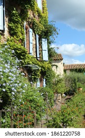 French Historic Village House With Flowers 