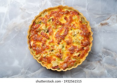 French homemade quiche lorraine pie on a marble background top view with copy space. - Shutterstock ID 1932561515