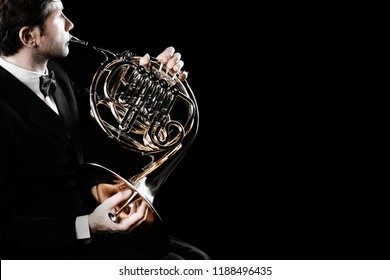 French Horn Player. Hornist Playing Brass Orchestra Music Instrument. Classical Musician