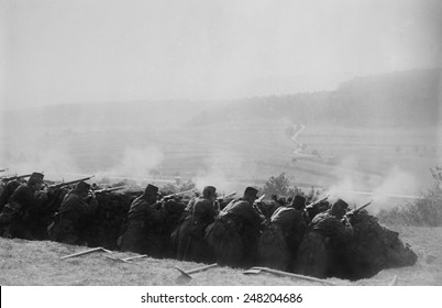 French Infantry Firing From A World War 1 Trench. 1914-15.